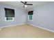 Bedroom with two windows and modern ceiling fan at 2917 Reveille Se Cir, Atlanta, GA 30316