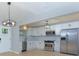 Updated kitchen with stainless steel appliances, white cabinets, and modern finishes at 2917 Reveille Se Cir, Atlanta, GA 30316