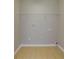 Empty laundry room with washer and dryer hookups and a shelf for storage at 2917 Reveille Se Cir, Atlanta, GA 30316