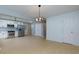 Bright, open floor plan featuring updated kitchen and dining area with a modern aesthetic at 2917 Reveille Se Cir, Atlanta, GA 30316