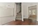 Inviting foyer with hardwood floors and staircase leading to the upper level at 3570 Steve Nw Dr, Marietta, GA 30064