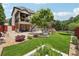 Expansive backyard featuring a patio, lush lawn, garden, hot tub, fire pit and plenty of space for entertaining at 5068 Bentwater Sw Ln, Lilburn, GA 30047