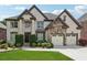 Beautiful two-story brick home with a well-manicured lawn and a two-car garage at 5068 Bentwater Sw Ln, Lilburn, GA 30047