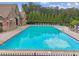 Sparkling community swimming pool with ample seating and a serene, relaxing atmosphere at 5068 Bentwater Sw Ln, Lilburn, GA 30047