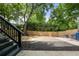 Large, fenced backyard with a combination of mulched and grassy areas, perfect for outdoor activities at 770 Ormewood Se Ave, Atlanta, GA 30312