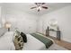 Spacious bedroom with hardwood floors, ceiling fan and modern decor, offering a tranquil space at 770 Ormewood Se Ave, Atlanta, GA 30312