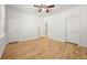 Empty bedroom featuring hardwood floors, two closets and a window offering plenty of natural light at 770 Ormewood Se Ave, Atlanta, GA 30312