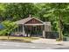 Charming home with a welcoming front porch, lush landscaping, and a well-maintained yard at 770 Ormewood Se Ave, Atlanta, GA 30312