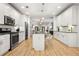 Modern kitchen featuring a center island, stainless steel appliances, and ample cabinet space at 770 Ormewood Se Ave, Atlanta, GA 30312
