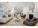 Bright and airy living room with hardwood floors, fireplace and an open floor plan at 770 Ormewood Se Ave, Atlanta, GA 30312