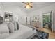 Spacious main bedroom with hardwood floors, a large dresser, and lots of natural light at 770 Ormewood Se Ave, Atlanta, GA 30312