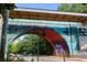 Painted with unique mural art, the Ormewood Ave bridge stands over a road with cars and pedestrians at 770 Ormewood Se Ave, Atlanta, GA 30312