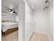 Walk-in closet with view into bedroom with ceiling fan and bed at 770 Ormewood Se Ave, Atlanta, GA 30312