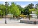 Zoo Atlanta entrance with benches, signage, and landscaping, welcoming visitors for a Gathering-friendly adventure at 770 Ormewood Se Ave, Atlanta, GA 30312