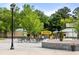 Entrance to Zoo Atlanta, featuring benches, landscaping, and the ticket booths at 770 Ormewood Se Ave, Atlanta, GA 30312