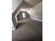 Attic bedroom featuring soft carpeting, neutral walls and ceiling, and dormer window at 1201 Saint Andrews Dr, Auburn, GA 30011
