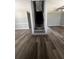Living room showcasing modern flooring and a staircase at 1201 Saint Andrews Dr, Auburn, GA 30011