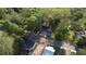 Aerial view of a tree-lined neighborhood showcasing quiet residential area with surrounding trees at 2228 Emory St, Covington, GA 30014