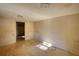 Neutral bedroom featuring bare walls and floors, offering a blank canvas for customization at 2228 Emory St, Covington, GA 30014