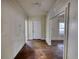Entryway featuring hardwood floors and a view into the main living spaces at 2228 Emory St, Covington, GA 30014