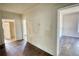 Living space featuring hardwood floors with doorways leading to other rooms at 2228 Emory St, Covington, GA 30014