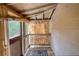 Sunroom featuring traditional wood-and-bamboo blinds, capturing natural light with rustic charm at 2228 Emory St, Covington, GA 30014