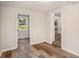 Bright bedroom with hardwood floors and natural light streaming through the window at 2406 Tilson Rd, Decatur, GA 30032