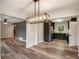 Open concept layout, connecting kitchen, living room and dining areas at 2406 Tilson Rd, Decatur, GA 30032