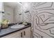 The bathroom vanity features an artsy design, adding a unique touch to the space at 4023 Port Springs Trl, Snellville, GA 30039