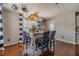 A dining area with hardwood floors, decorated with balloons, perfect for celebrating special moments at 4023 Port Springs Trl, Snellville, GA 30039
