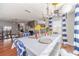 A dining room has a long table topped with decor and decorative balloons for celebrations at 4023 Port Springs Trl, Snellville, GA 30039