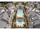 Aerial view of luxury townhome community with two swimming pools and manicured landscaping at 6807 Prelude Dr, Atlanta, GA 30328