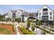 Stunning exterior view of upscale townhome community with beautifully landscaped grounds at 6807 Prelude Dr, Atlanta, GA 30328