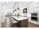 Elegant kitchen with a large island, stainless steel appliances, and lots of storage at 6807 Prelude Dr, Atlanta, GA 30328