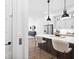 Open-concept kitchen featuring a breakfast bar, stainless steel appliances, and seamless flow at 6807 Prelude Dr, Atlanta, GA 30328