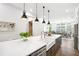 Gourmet kitchen with quartz countertops, stainless steel appliances, and open floorplan at 6807 Prelude Dr, Atlanta, GA 30328
