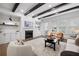 Stylish living room with fireplace, built-in shelving, and modern furnishings at 6807 Prelude Dr, Atlanta, GA 30328