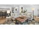 Spacious living area featuring a large sectional sofa, patterned rug, and stylish decor at 6807 Prelude Dr, Atlanta, GA 30328