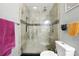 Bathroom with large glass shower, tiled walls, and neutral finishes at 6980 Roswell Road # A8, Atlanta, GA 30328