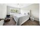 Cozy bedroom featuring a queen-size bed, plush carpeting, and neutral tones at 6980 Roswell Road # A8, Atlanta, GA 30328