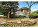 Stone Manor Sandy Springs community sign with lush greenery at 6980 Roswell Road # A8, Atlanta, GA 30328
