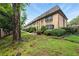 Brick townhouses with beautiful landscaping and green lawns at 6980 Roswell Road # A8, Atlanta, GA 30328
