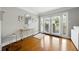 Bright living room with hardwood floors and french doors at 6980 Roswell Road # A8, Atlanta, GA 30328