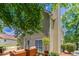 Staged backyard featuring outdoor furniture and a peaceful setting at 12241 Cypress Way, Fayetteville, GA 30215
