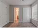Bedroom with doors to a bathroom and closet at 12241 Cypress Way, Fayetteville, GA 30215