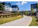Modern apartment complex featuring landscaped walkways, lush greenery, and inviting outdoor spaces for residents to enjoy at 170 Boulevard Se # 115E, Atlanta, GA 30312