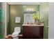 Well-lit bathroom featuring a modern vanity, toilet, and stylish fixtures at 170 Boulevard Se # 115E, Atlanta, GA 30312