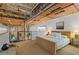 Comfortable bedroom featuring exposed wood beams and neutral decor at 170 Boulevard Se # 115E, Atlanta, GA 30312