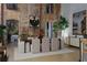 Dining room area featuring exposed brick and modern furnishings at 170 Boulevard Se # 115E, Atlanta, GA 30312