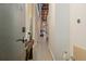 Long hallway with exposed brick, high ceilings, and modern lighting fixtures at 170 Boulevard Se # 115E, Atlanta, GA 30312